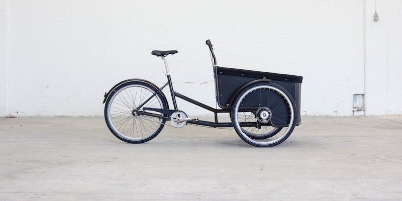 Dreirädriges Lastenfahrrad mit Transportbox vorne Ein Lastenrad ist ein Fahrradtyp für größere Transporte